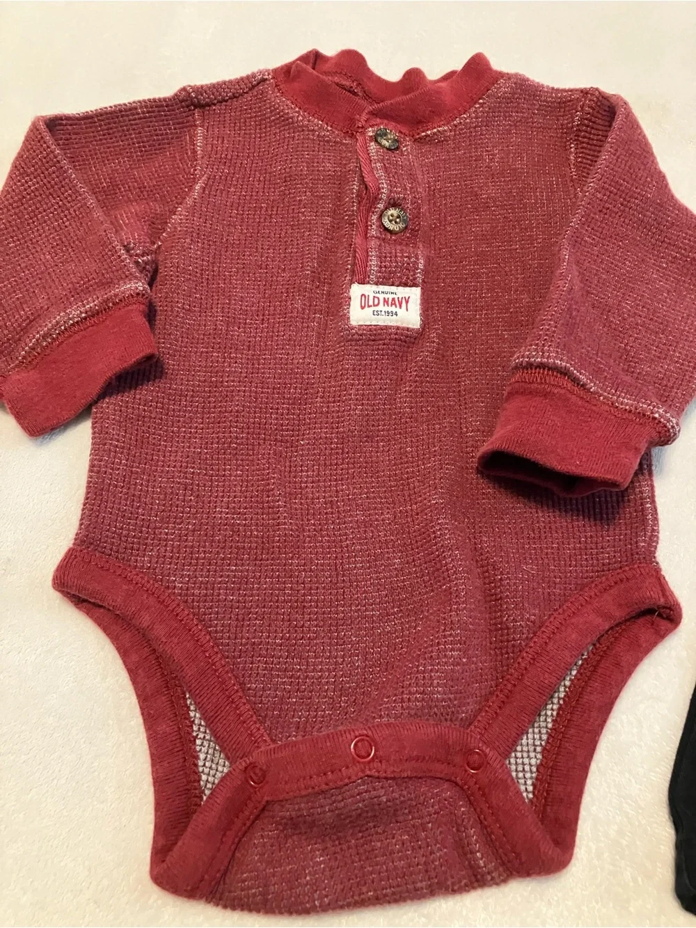 Red Baby Henley Bodysuit and Black Pants